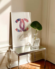 After Hover: Mode - Zitat von Coco Chanel mit buntem Muster