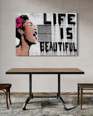 After Hover: Banksy - Life is beautiful Frau mit Rose im Haar mit Schriftzug